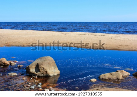  sandy beach surrounded by water. amazing nature