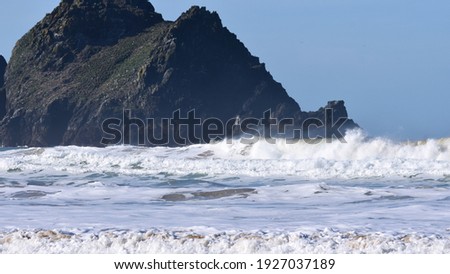Surf breaking at the beach Holywell Bay, Cornwall Royalty-Free Stock Photo #1927037189