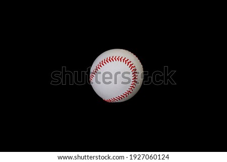 Baseball ball on a black background.