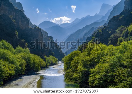 Unique natural landscape from the Vikos–Aoös National Park. The towering mountain peaks of Pindus mountain, the spectacular Vikos Gorge carved by the Aoös river compose the geopark. Epirus. Greece. Royalty-Free Stock Photo #1927072397