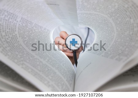 Concept of health insurance and treatment with love based on knowledge. Royalty-Free Stock Photo #1927107206