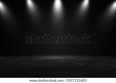 Product showcase with spotlight. Black studio room background. Use as montage for product display  Royalty-Free Stock Photo #1927122683