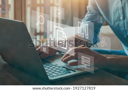 ERP, document management concept with icons on virtual screen Royalty-Free Stock Photo #1927127819