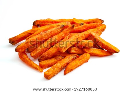 Healthy carbohydrates and carbohydrate and fiber rich foods vegetarian foods concept with picture of sweet potato fries isolated on white background with clipping path cutout