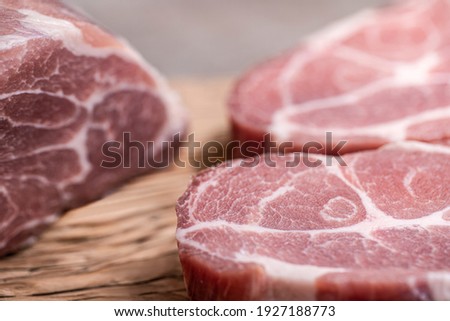 Fresh marbled steaks cut for grilling