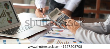 Business analyst team checking in financial statement for audit internal control system. Accounting, auditing team  Concept. Royalty-Free Stock Photo #1927208708