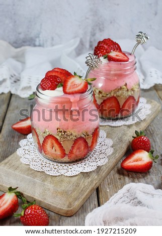 Strawberry Cheesecake Parfait with Cacao and Granola layer, topped with Coconut Yogurt - Vegan 