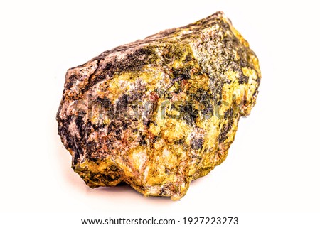 Uranium, radioactive ore on isolated white background Royalty-Free Stock Photo #1927223273