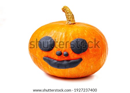 Lonely orange yellow pumpkin on white background decoration happy smile face.