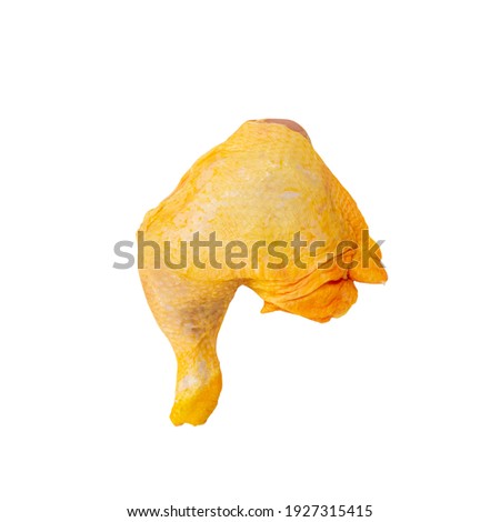 piece of raw yellow chicken, leg and thigh with skin ready for cooking, cut chicken on white background Royalty-Free Stock Photo #1927315415