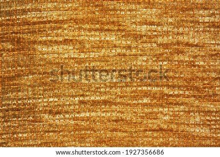 Brown background, background cloth, texture and pattern of velvet with brown stripes.