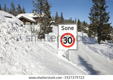 Thirty km per hour zone in Trysil, Norway, on sunny winter day