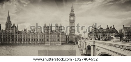 London Bridge and Houses of Parliament with Thames river.