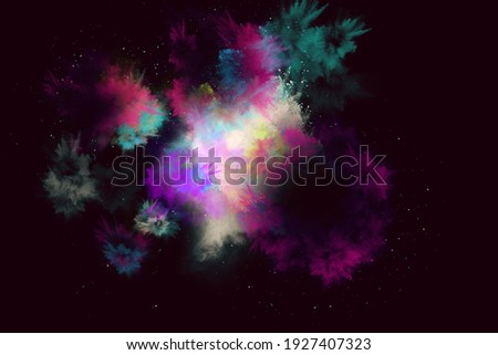 Colored powder explosion. Abstract closeup dust on black background.  Royalty-Free Stock Photo #1927407323
