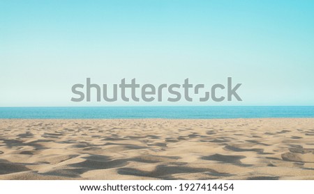 sandy sea coast with white sand, empty beach, concept resort holiday Royalty-Free Stock Photo #1927414454