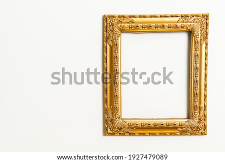empty picture frame on white wall background with copy space