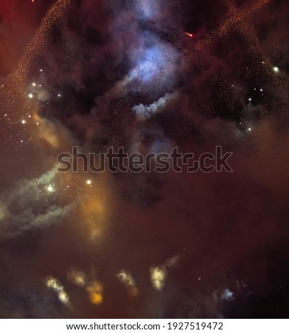 Abstract background of burning fireworks, smoke and fireworks. Space Concept
