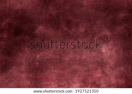 Red burgundy wall grunge background or texture  Royalty-Free Stock Photo #1927521350