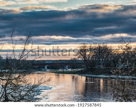 Spring evening with stunning cloudy blue skies and river views