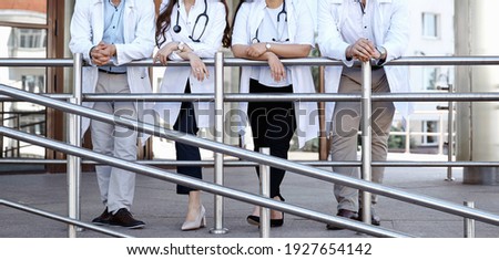 Healthcare. Medical team - doctor, nurse and surgeon. A group of faceless doctors. Professional medical advertisement design. Background wide promotional banner.