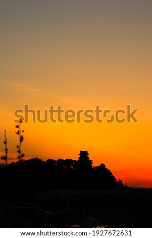 Silhouette of Inuyama Castle and the sunset sky dyed red