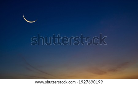 Night Sky with Crescent Moon and Stars Shining, Landscape Dramatic Dark Blue, Purple and OrangeSky, Beautiful Panoramic view of Dusk Sky Twilight Natural background Royalty-Free Stock Photo #1927690199