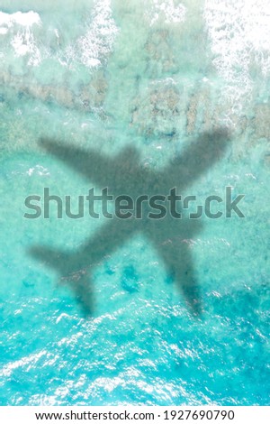 Travel traveling vacation sea symbolic picture airplane flying copyspace copy space Seychelles portrait format water image