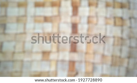 Defocused abstract background of woven bamboo mats