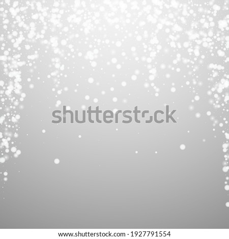 Beautiful falling snow Christmas background. Subtle flying snow flakes and stars on light grey background. Admirable winter silver snowflake overlay template. Ecstatic vector illustration.