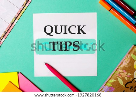 QUICK TIPS written on a turquoise background near bright stickers, notepads and markers