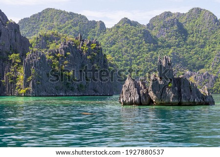 Island hoping at Coron island, Palawan, Philippines Royalty-Free Stock Photo #1927880537