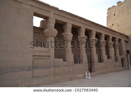 A group of Pharaonic pillars made of stone from Philae Temple, Aswan Governorate, Egypt