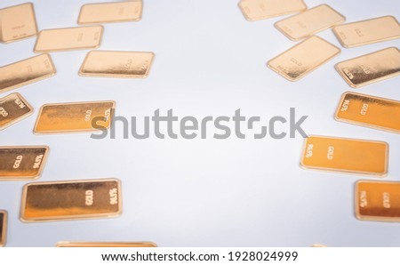 Gold bars on a white background. Ingots background