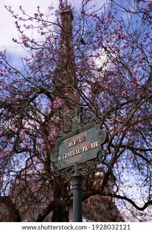Sign in front of Eiffel Tower 