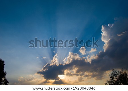 landscape picture mountain and sun rays penetrating through clouds.
