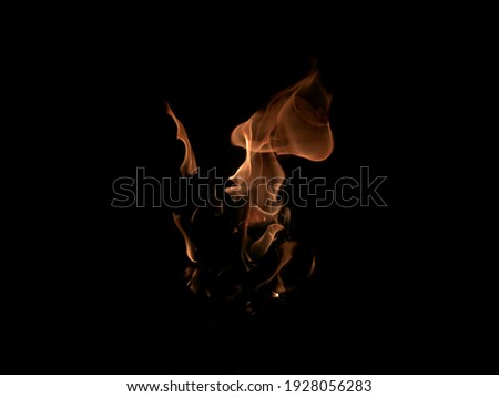 Hot fire energy burning fuel on black background