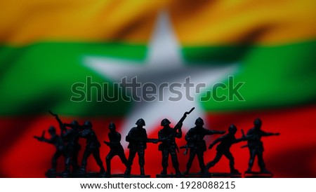 Myanmar military coup soldiers, flag map background  Royalty-Free Stock Photo #1928088215