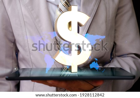 businessman holding tablet and business money idea concept