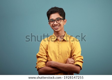 Portrait of a happy young boy of Indian origin Royalty-Free Stock Photo #1928147255
