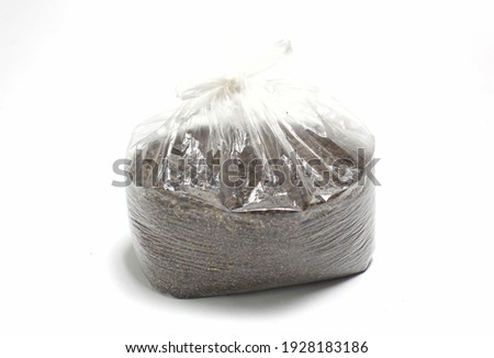 plastic with cassava rice in it. isolated on a white background