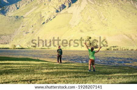 people playing in badminton outdoors
