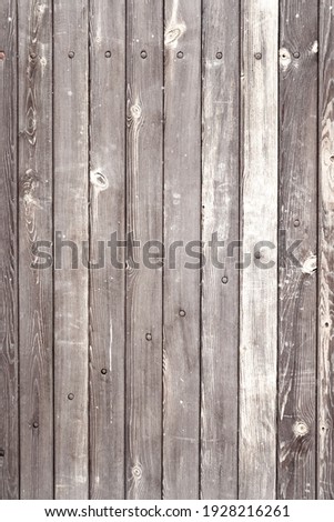 Old gray grunge wooden fence planks, background, texture.