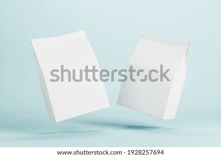 Two white paper bags with copyspace for your logo levitating in the air at blue background. 3D rendering, mock up