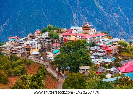 Kalpa and Kinnaur Kailash mountain aerial panoramic view. Kalpa is a small town in the Sutlej river valley, Himachal Pradesh in India Royalty-Free Stock Photo #1928257790