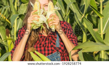 Female farmer or gardener holding her crop fresh vegetable. Agriculture -food production, harvest concept	