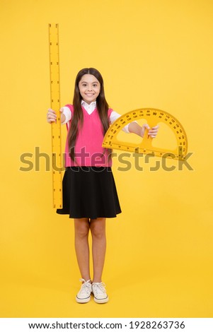 Towards knowledge. happy teen girl hold ruler. back to school. algebra and geometry. kid study math. stem disciplines. concept of education. measure the angle. child with protractor. measurement.
