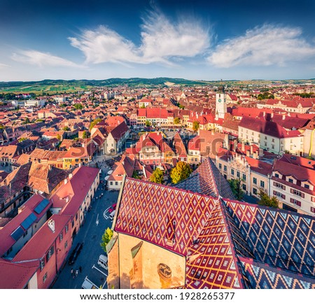 Aerial landscape photography. Amazing summer view of Tower of Council. Attractive cityscape of Sibiu town, Transylvania, Romania, Europe. Traveling concept background.