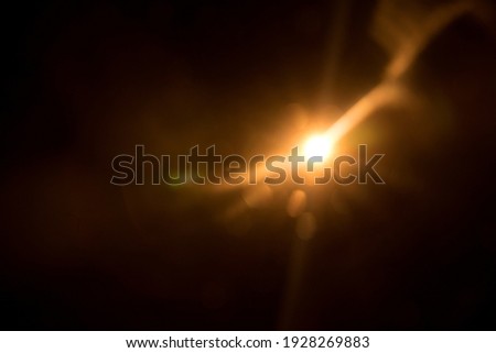 Abstract Natural Sun flare on the black Royalty-Free Stock Photo #1928269883