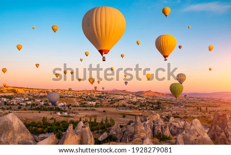 Bright hot air balloons in sky of Cappadocia, Turkey Royalty-Free Stock Photo #1928279081