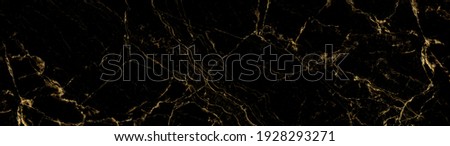 black golden stone texture with glossy surface. Royalty-Free Stock Photo #1928293271